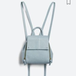 Market and spruce jenni mini wrap handle back pack baby blue.
